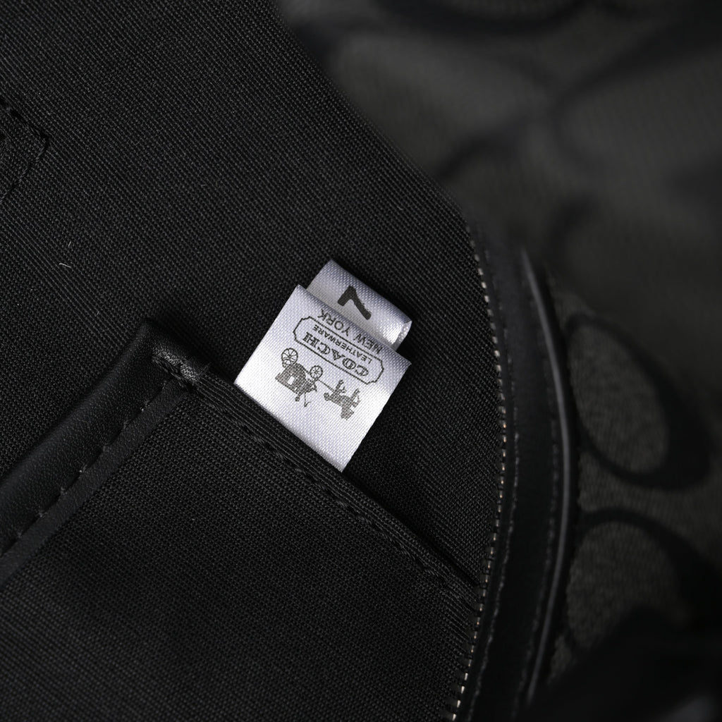 Coach Metropolitan Duffel Bag in Signature Black Canvas