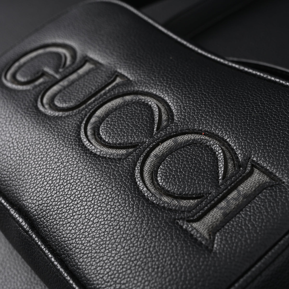 Gucci Black Leather Embossed Logo Belt Bag